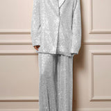 Cekinowy zestaw z marynarką i szerokimi spodniami