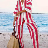 Dzianinowy komplet w paski z dekoltem V i szerokimi spodniami