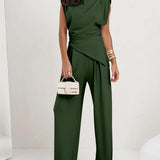 Elegancki komplet z asymetryczną bluzką i szerokimi spodniami