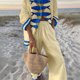 Komplet oversize z motywem oceanicznym i szerokimi spodniami