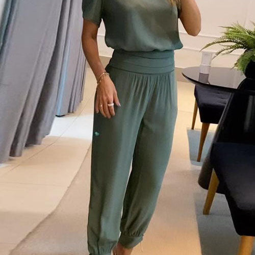 Elegancki komplet z bluzką V-neck i luźnymi spodniami z wysoką talią