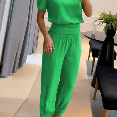 Elegancki komplet z bluzką V-neck i luźnymi spodniami z wysoką talią