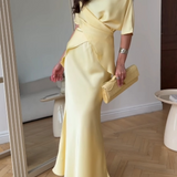 Elegancki komplet z wiązaną bluzką i długą spódnicą