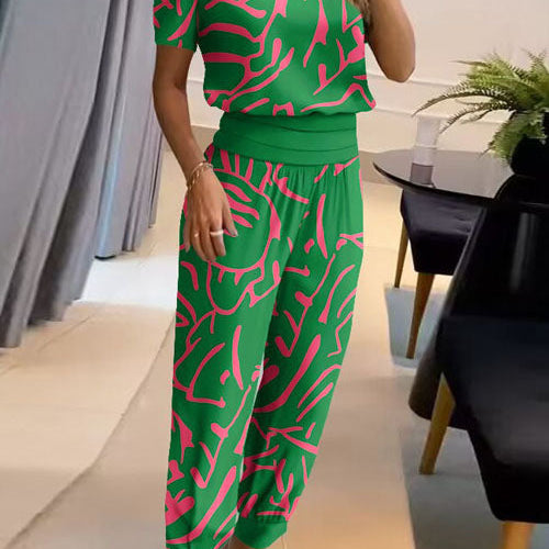 Elegancki komplet z bluzką V-neck i luźnymi spodniami z wysoką talią