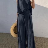 Minimalistyczny komplet z topem bez rękawów i szerokimi spodniami