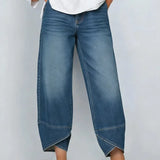 Damskie jeansy z nadrukiem krzyżowym