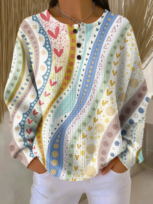 Anita | Sweter w radosny wzór z serduszkami