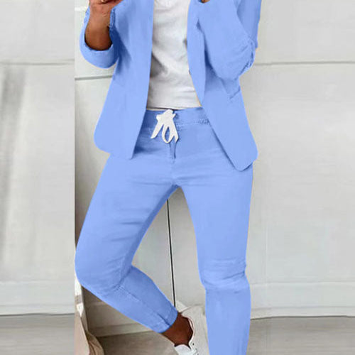 Czarny elegancki komplet z taliowaną marynarką i dopasowanymi spodniami ze sznurkiem