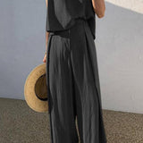 Minimalistyczny komplet z topem bez rękawów i szerokimi spodniami