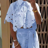 Koronkowy komplet z haftem i szerokimi spodniami z wysokim stanem