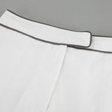 Elegancki komplet z koszulą i szortami z kontrastową lamówką