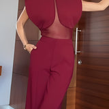 Elegancki bordowy kombinezon z transparentnym panelem