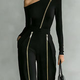 Elegancki komplet czarny z asymetrycznym dekoltem i złotymi zamkami