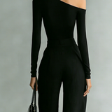 Elegancki komplet czarny z asymetrycznym dekoltem i złotymi zamkami