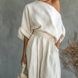 Komplet lniany: top z odkrytymi ramionami i zwężane spodnie