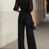 Czarny trzyczęściowy zestaw z szyfonową bluzką i szerokimi spodniami