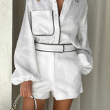 Elegancki komplet z koszulą i szortami z kontrastową lamówką