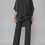 Elegancki zestaw z asymetryczną, warstwową bluzką i szerokimi spodniami z wysokim stanem