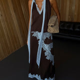 Elegancka spódnica midi z koronkowym wykończeniem