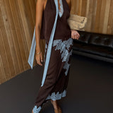 Elegancka spódnica midi z koronkowym wykończeniem