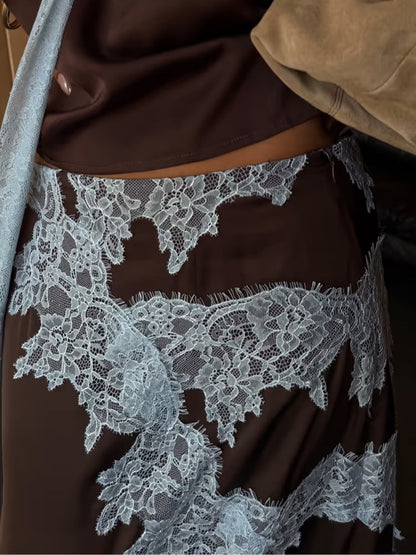 Elegancka spódnica midi z koronkowym wykończeniem