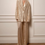 Cekinowy zestaw z marynarką i szerokimi spodniami