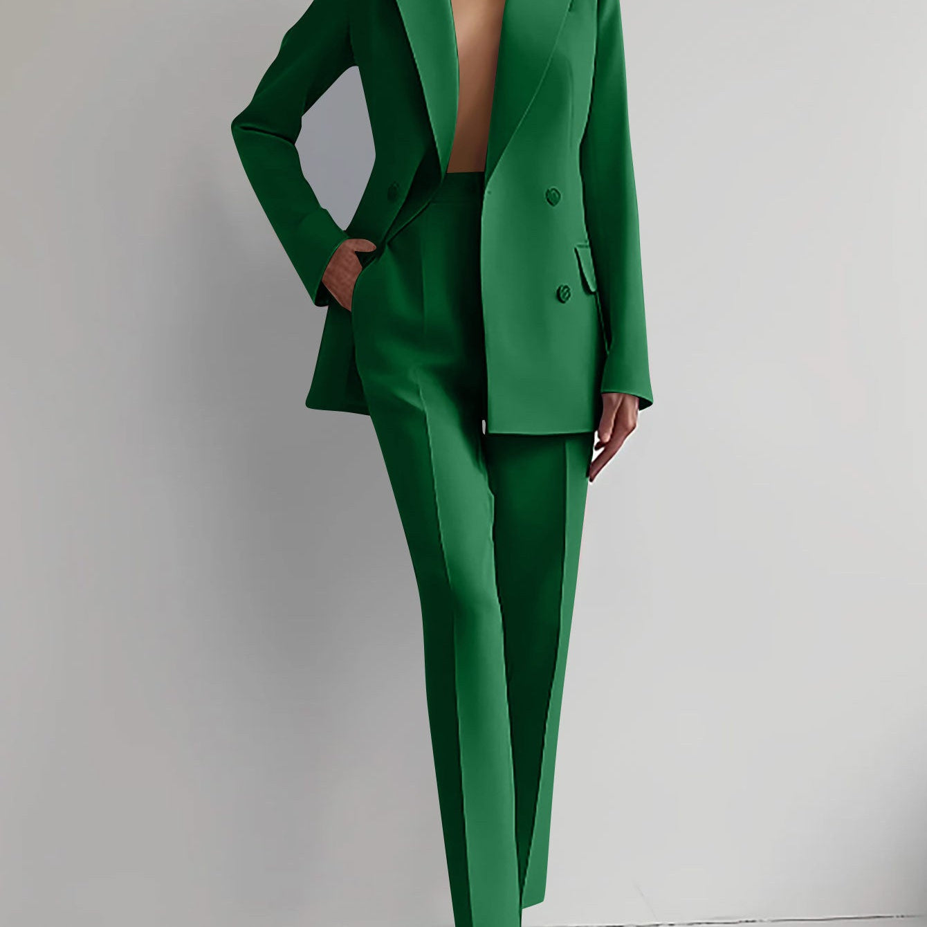 Elegancki garnitur damski z taliowaną marynarką i prostymi spodniami