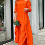 Zwiewny komplet z asymetryczną tuniką i szerokimi spodniami