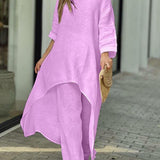 Zwiewny komplet z asymetryczną tuniką i szerokimi spodniami