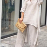 Zwiewny komplet z asymetryczną tuniką i szerokimi spodniami