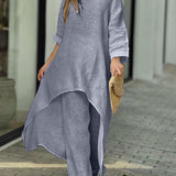 Zwiewny komplet z asymetryczną tuniką i szerokimi spodniami