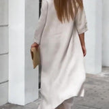 Zwiewny komplet z asymetryczną tuniką i szerokimi spodniami