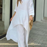 Zwiewny komplet z asymetryczną tuniką i szerokimi spodniami