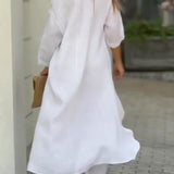 Zwiewny komplet z asymetryczną tuniką i szerokimi spodniami