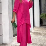 Zwiewny komplet z asymetryczną tuniką i szerokimi spodniami