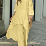 Zwiewny komplet z asymetryczną tuniką i szerokimi spodniami