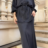 Elegancki komplet z koszulą wiązaną w talii i długą spódnicą