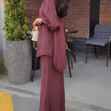 Elegancki komplet z koszulą wiązaną w talii i długą spódnicą